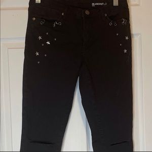 Black studded skinny jeans
